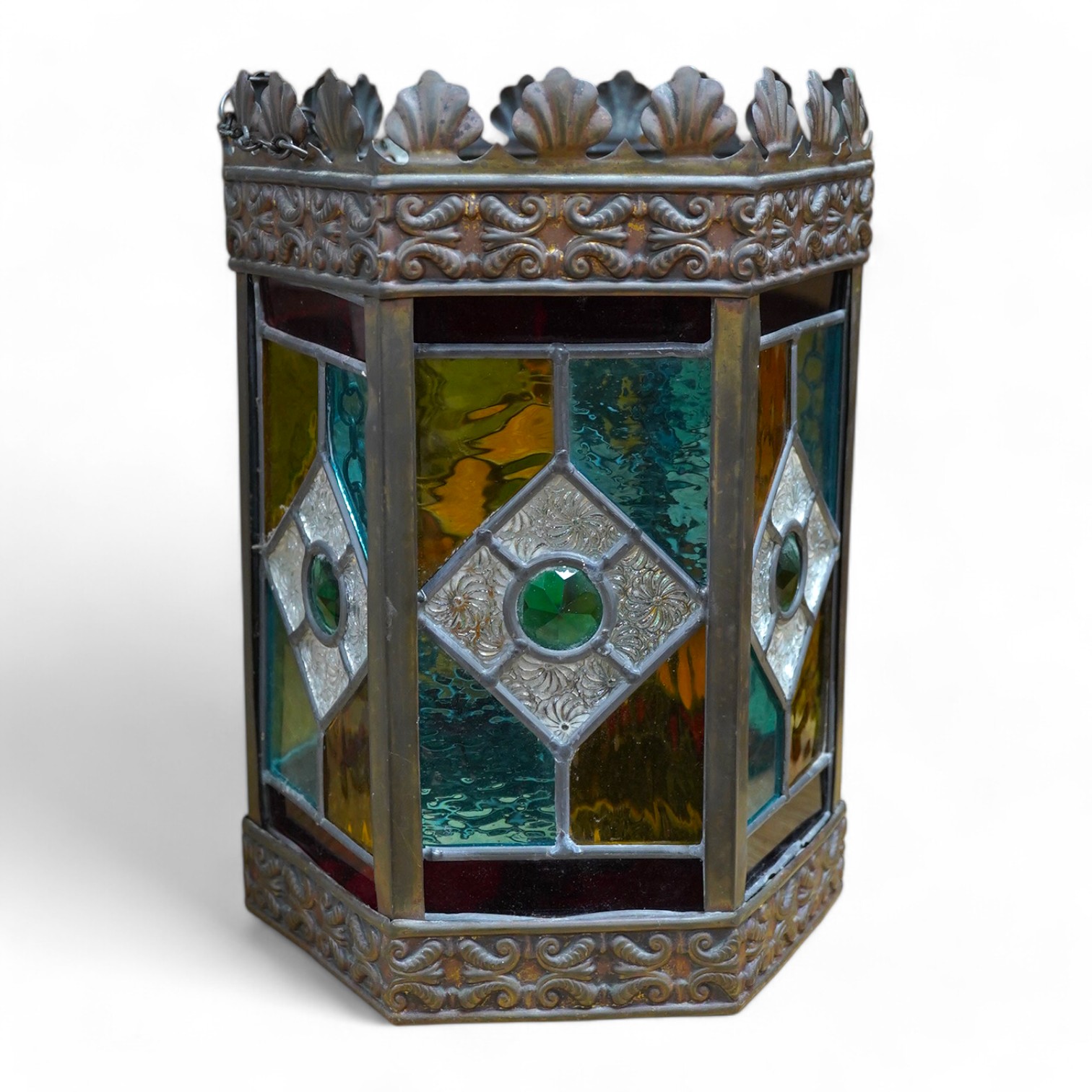 A Victorian coloured stained glass and brass six sided lantern, 31cm high x width 22cm. Condition - glass good, one clip on frame for glass missing